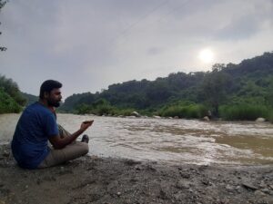Maggi at the bank of a river