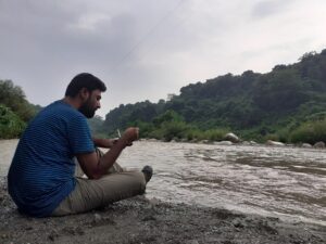 Maggi at the bank of a river
