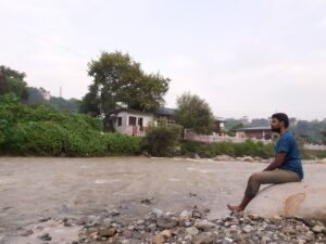 Maggi at the bank of a river